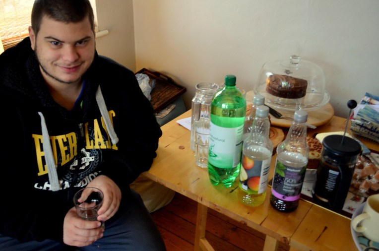 Jason enjoys the cake.