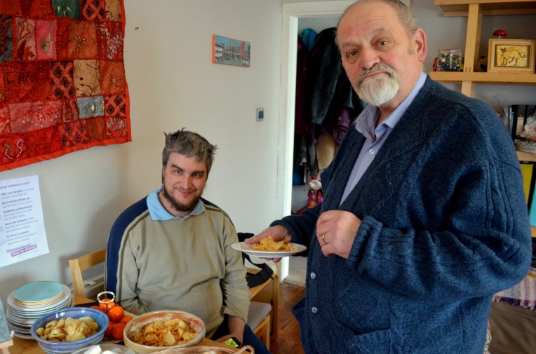 John and Barry enjoy a Hot Cross Bun.