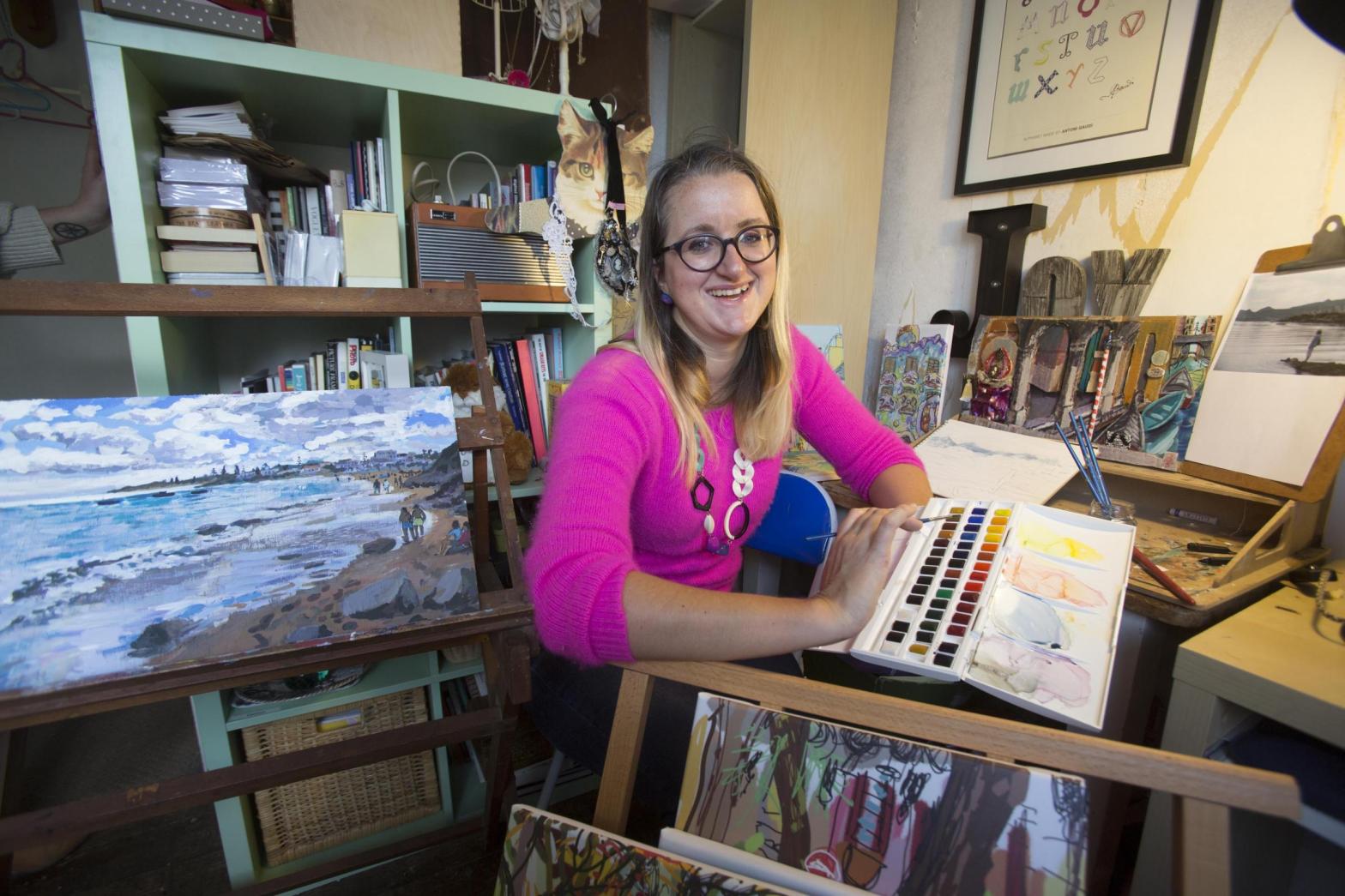 Katie preparing for 'Paintings from my Suitcase' Art Show. Credit: Peter Beal