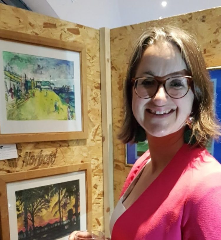 I'm an artist, here I am with my artwork (top) at a Hampshire exhibition.